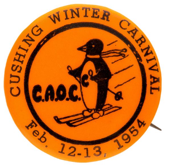 SKIING PENGUIN “CUSHING WINTER CARNIVAL” 1954 BUTTON.        