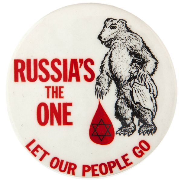 “RUSSIA’S THE ONE / LET OUR PEOPLE GO” CARTOON WITH BEAR AND STAR OF DAVID ON DROP OF BLOOD SOVIET JEWRY SCARCE BUTTON.     