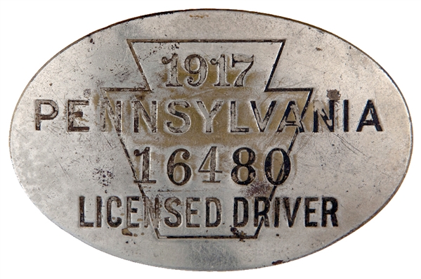 “1917 PENNSYLVANIA LICENSED DRIVER” NUMBERED SILVERED BRASS BADGE.