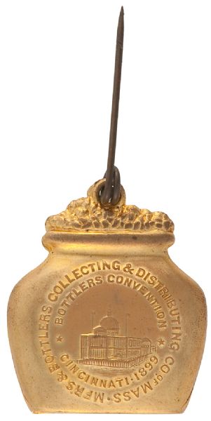 BOTTLERS CONVENTION 1899 EMBOSSED BRASS FIGURAL BADGE.