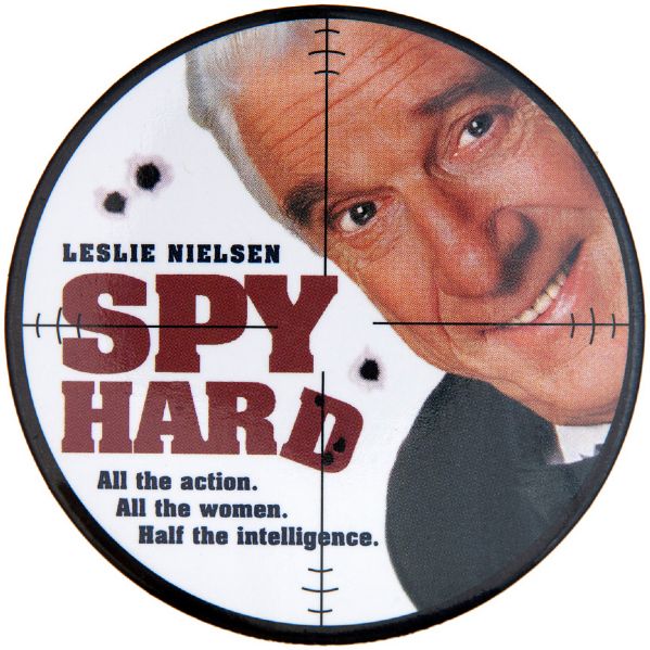 “SPY HARD LESLIE NEILSEN / ALL THE ACTION / ALL THE WOMEN / HALF THE INTELLIGENCE” 1996 MOVIE BUTTON.