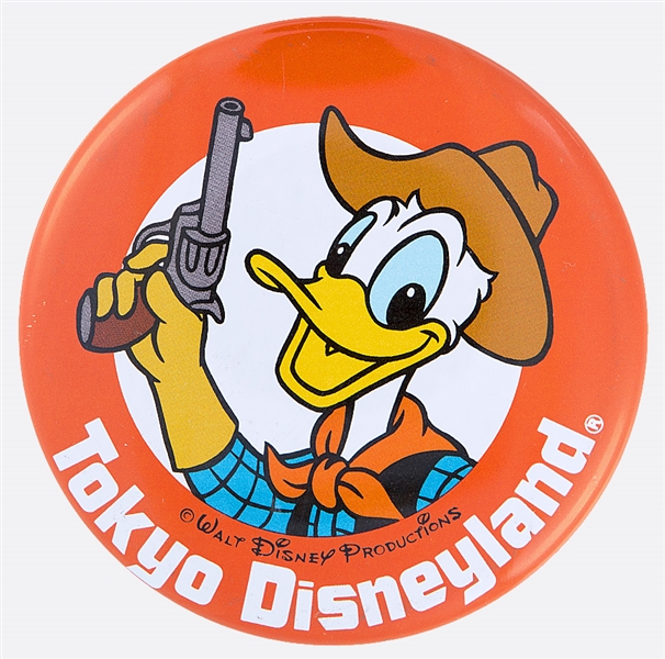 TOKYO DISNEYLAND WITH DONALD DUCK OFFICIAL DISNEY LITHO BUTTON.